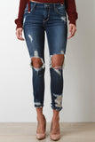 Distressed Open Knee Mid Rise Skinny Jeans
