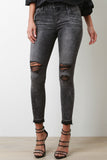 Faded Distressed Mid Rise Skinny Jeans